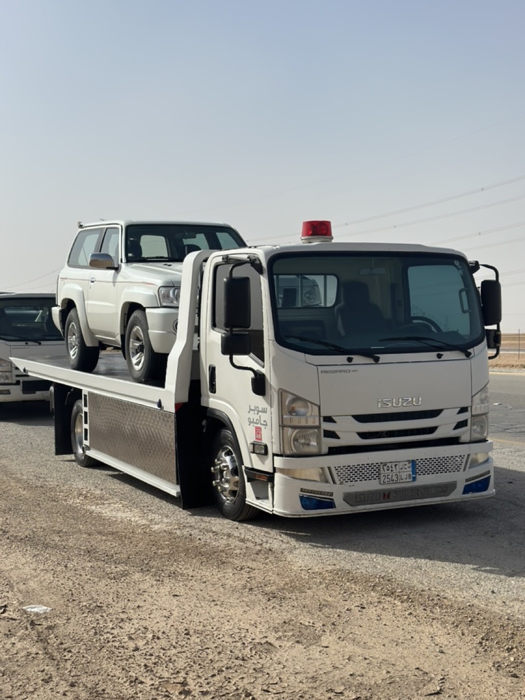 نقل باترول على سطحة حائل